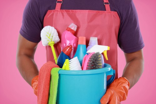 Cleaning a newly refurbished room after building work in SW16