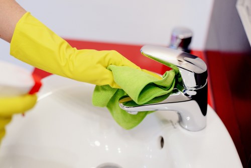 Professional carpet cleaners working on a residential carpet in SW16